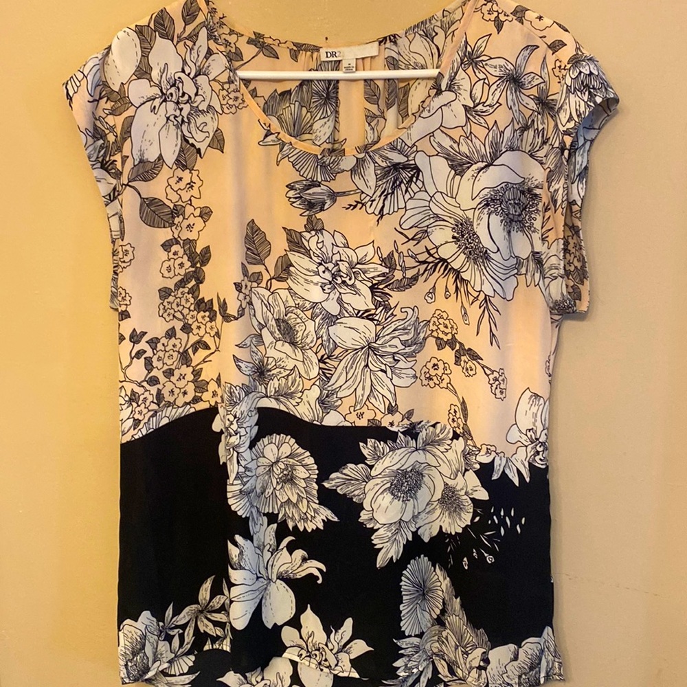 Woman’s black and pink blouse